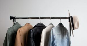 Image of clotes on a coat rack in a Crowdsourcing Week blog on training LLM data